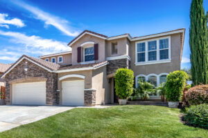 11 Front of house with green lawn and shrubs