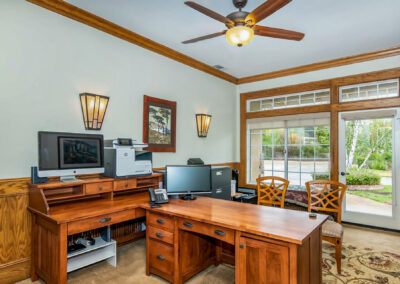 Office with wood furniture, ceiling fan and wood floors, tyler media works, real estate photography