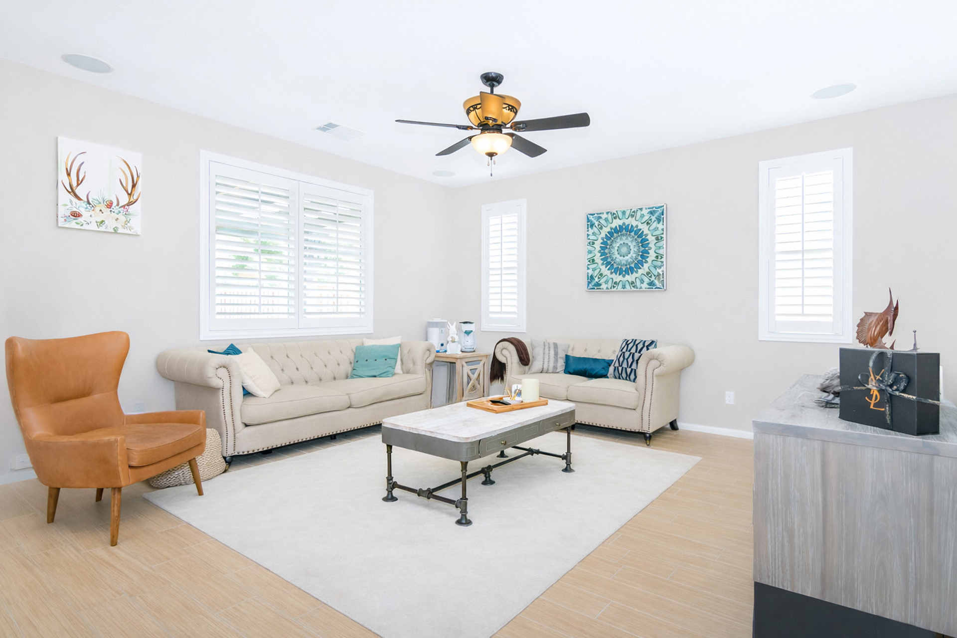 10 Living room with white couches and ceiling fan
