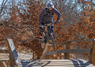 mountain biker going over a jump