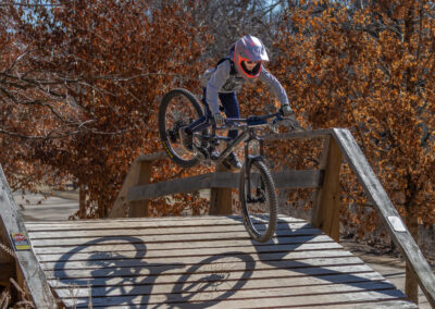 mountain biker going over a jump