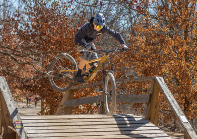 mountain biker going over a jump