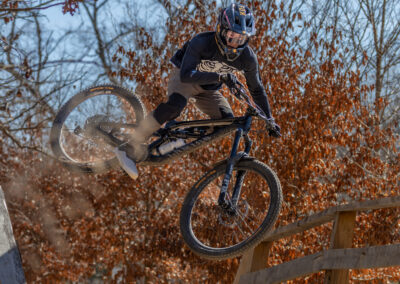 mountain biker going over a jump