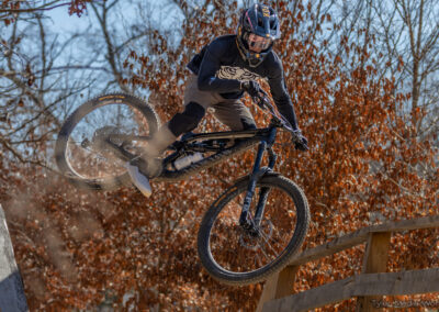 mountain biker going over a jump